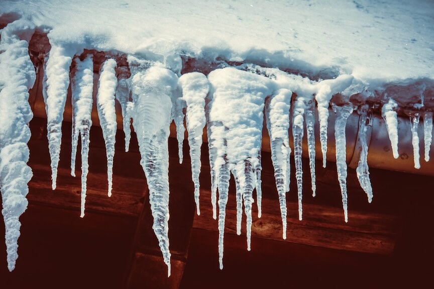 Gutter guards protecting home from ice and snow