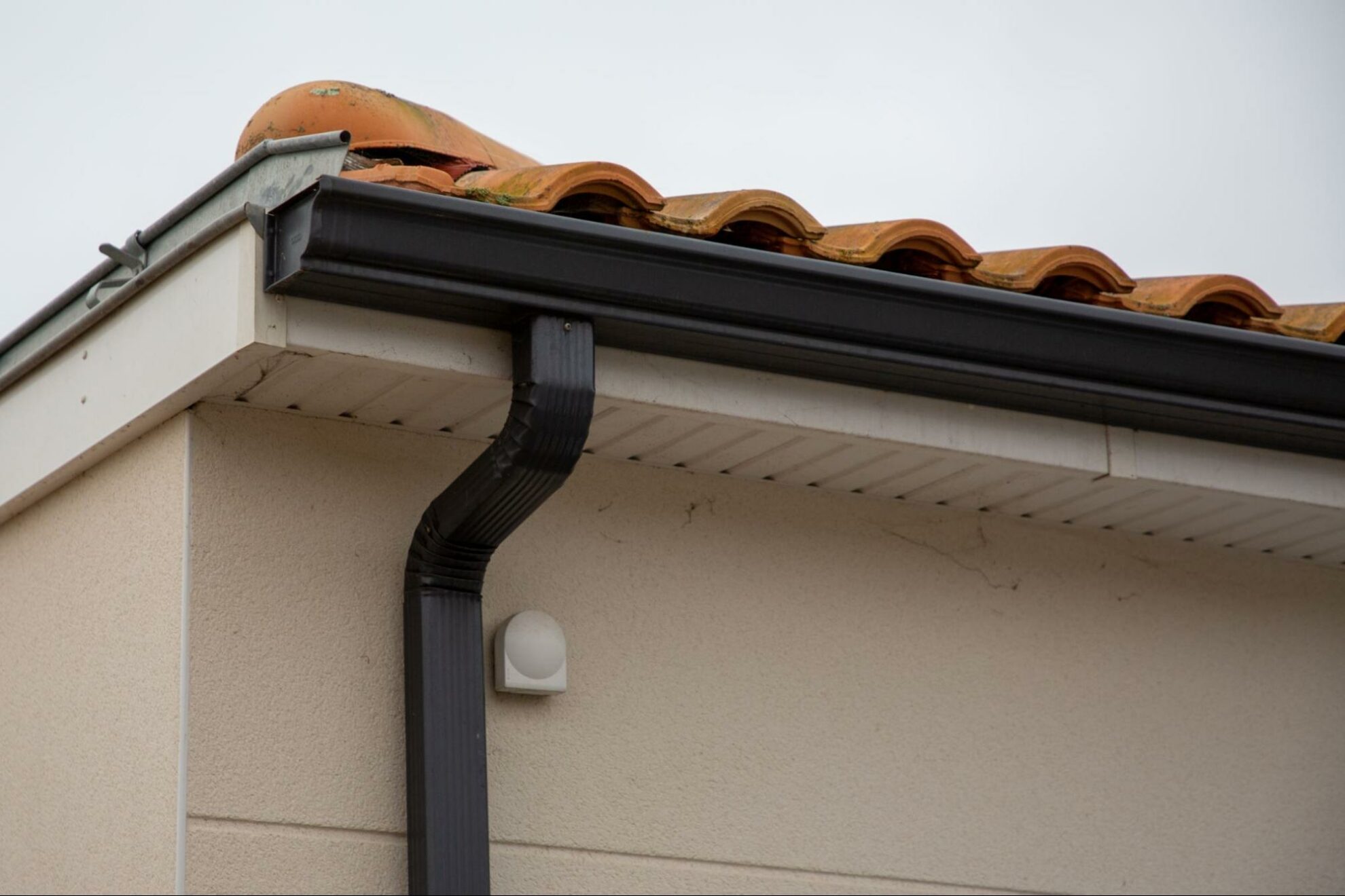 How Black Gutters Can Enhance Your Brick House?
