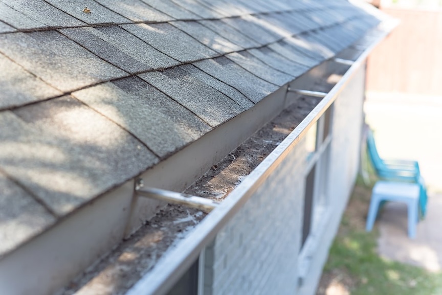 Damaged gutters showing clear signs of wear requiring immediate replacement